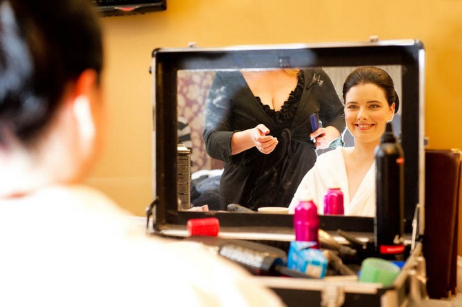 bride getting make up done
